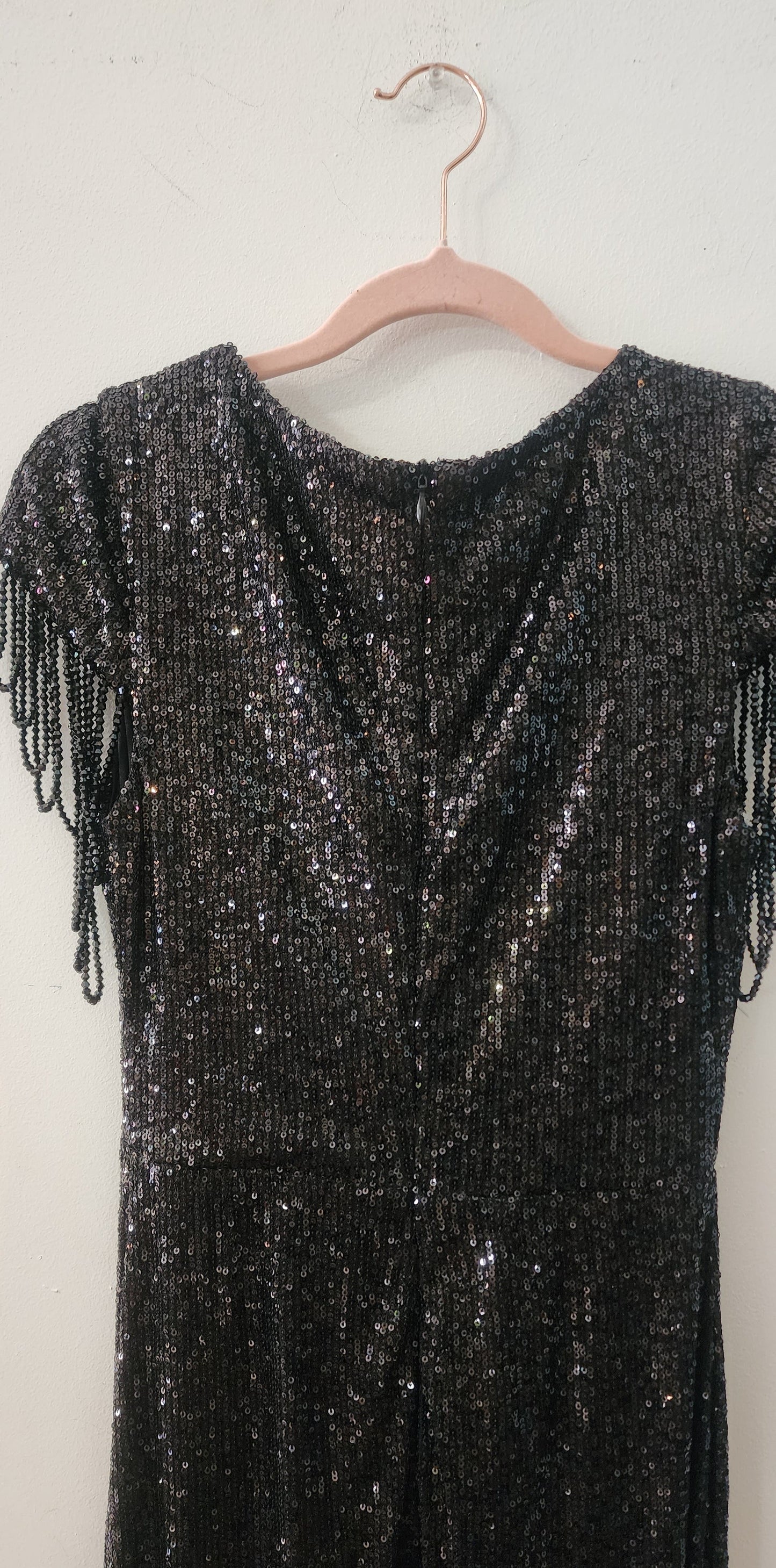 Evening long black sequence with draped fringe