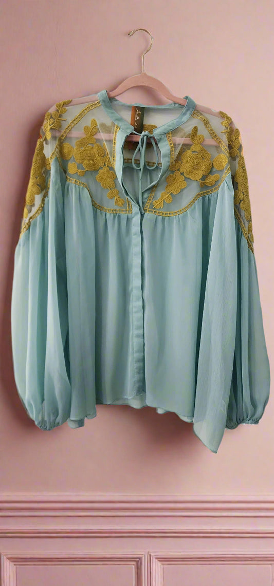 A Baby blue sheer boho blouse
