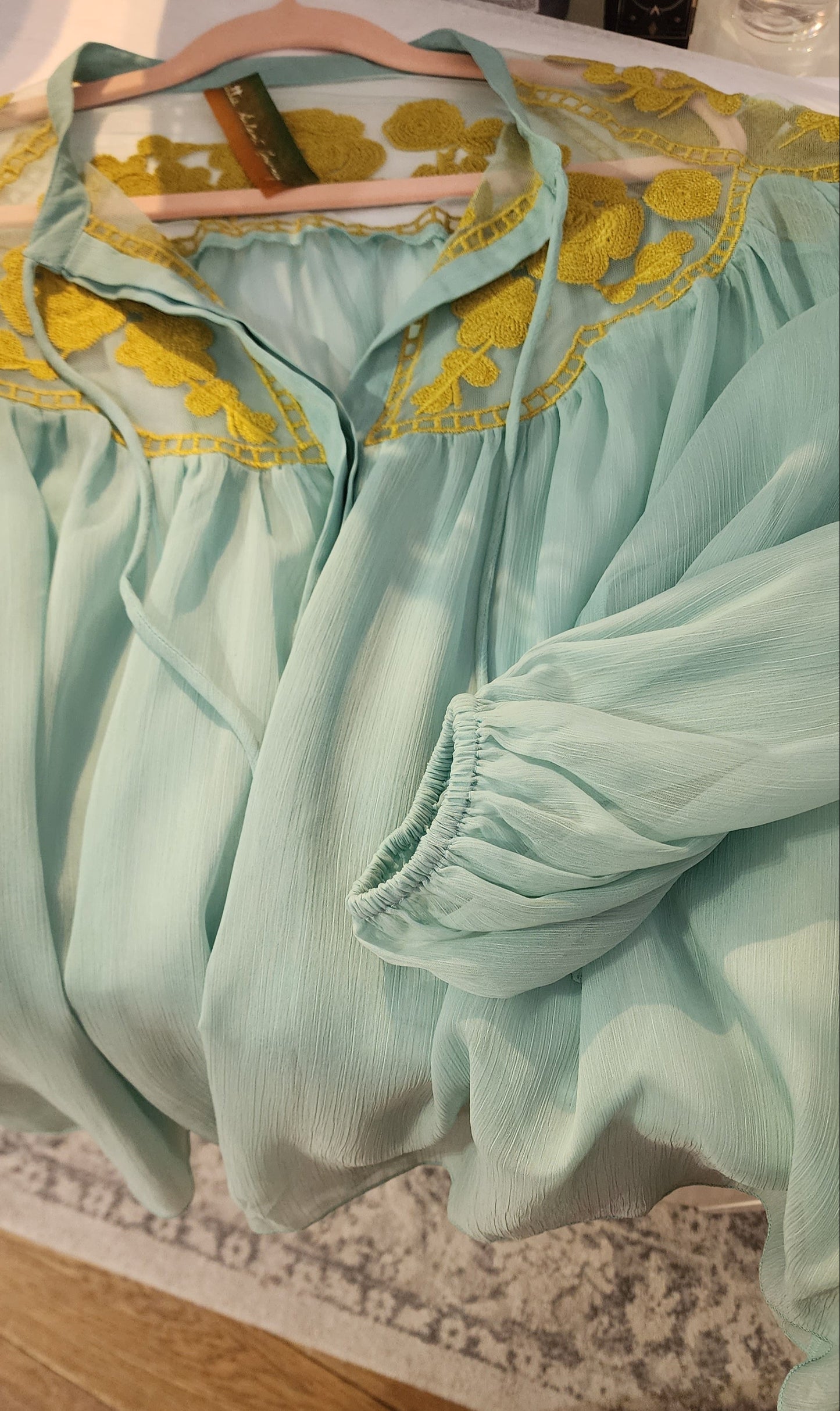 A Baby blue sheer boho blouse